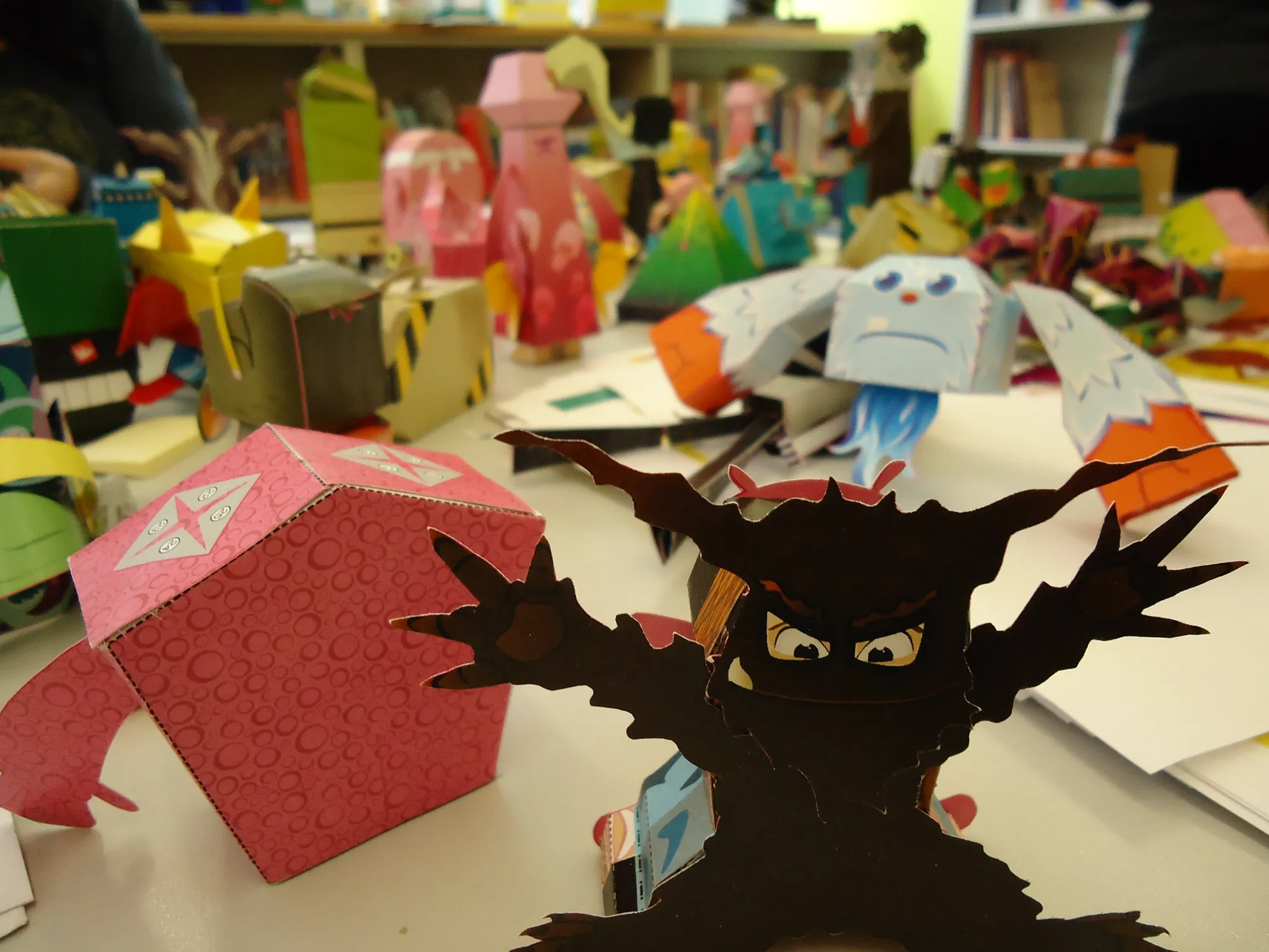 Papertoy workshop with assembled paper toys