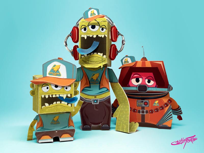 Detailed view of three Mailians paper toys
